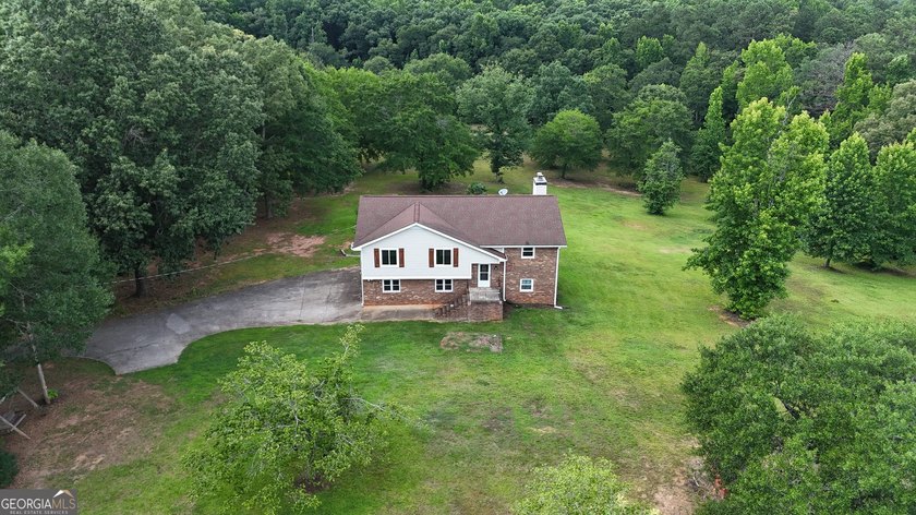 Nestled on 5 private acres with no HOA, this beautifully - photo 35