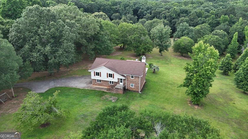 Nestled on 5 private acres with no HOA, this beautifully - photo 36