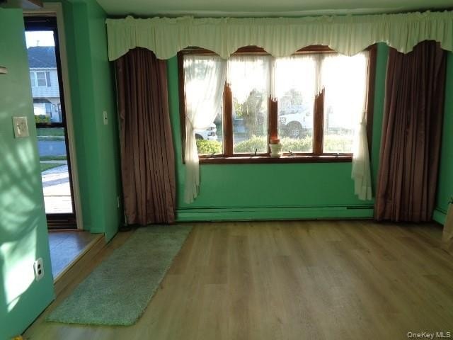 Well-maintained 3-bedroom, 2-bath expanded ranch featuring - photo 2