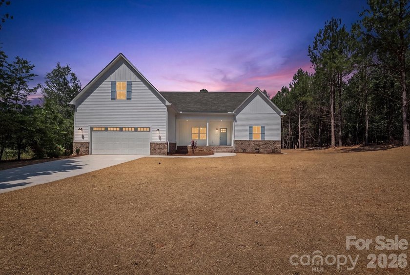 New Construction ranch home on large lot with bonus room above - photo 2