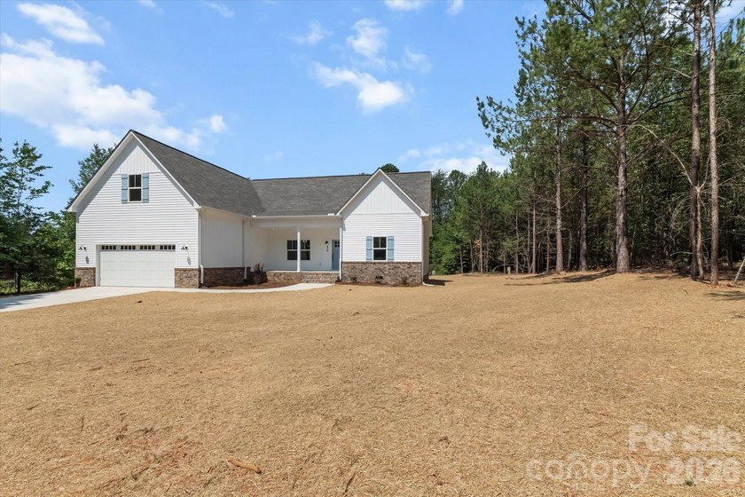 New Construction ranch home on large lot with bonus room above - photo 7