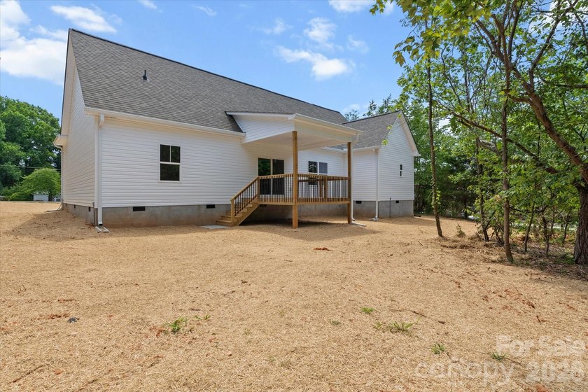 New Construction ranch home on large lot with bonus room above - photo 9