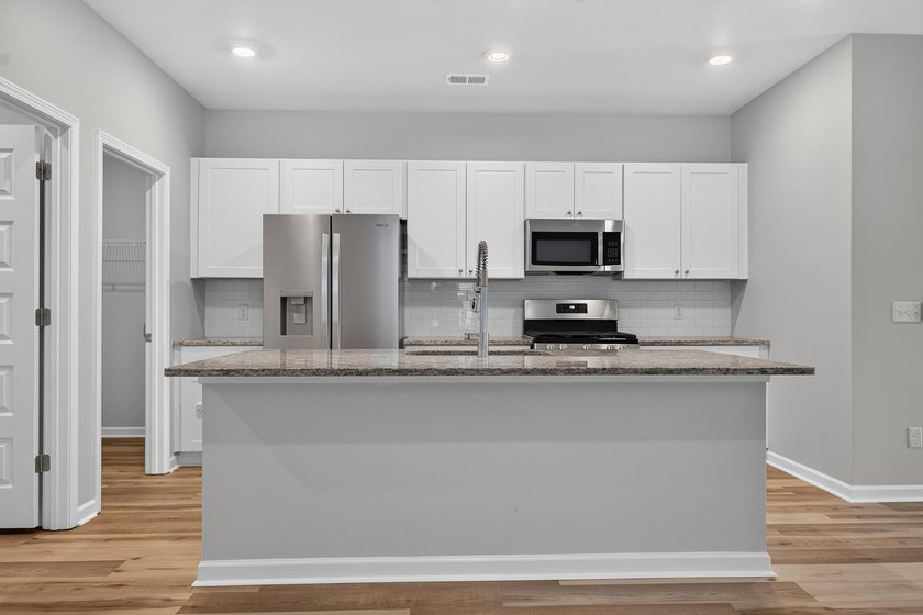 Imagine coming home every day to peaceful pond views, a spacious - photo 12