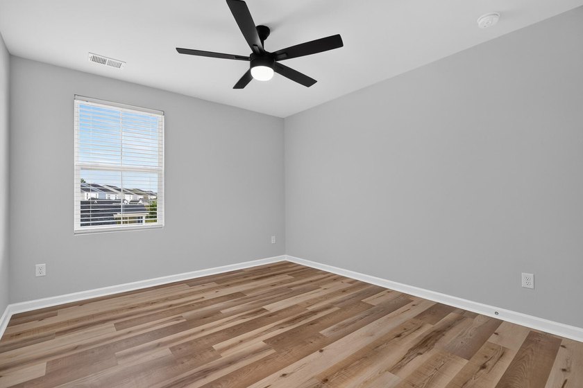Imagine coming home every day to peaceful pond views, a spacious - photo 34