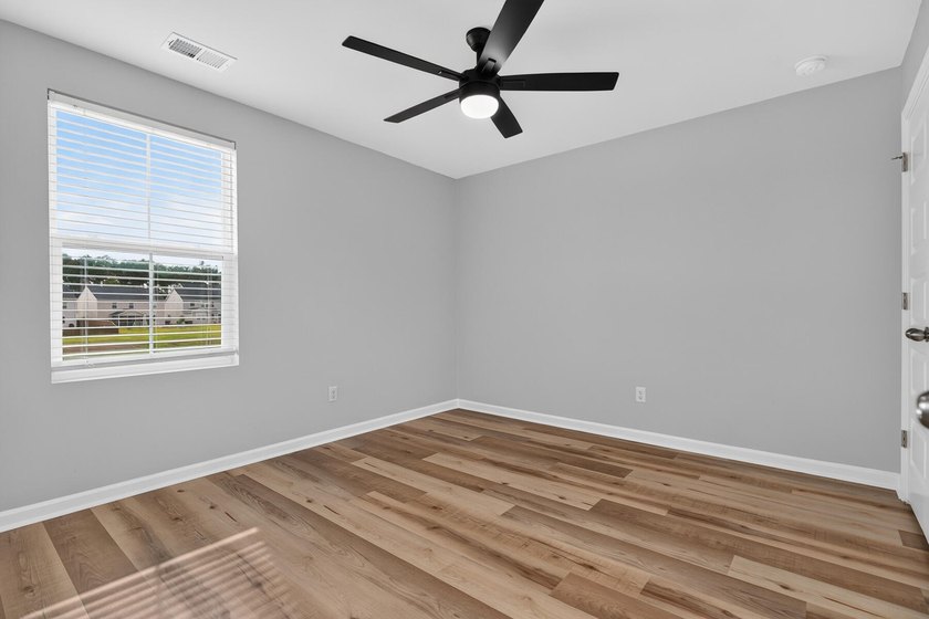 Imagine coming home every day to peaceful pond views, a spacious - photo 35