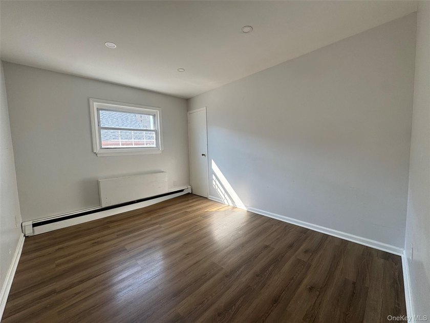 Spacious brick multifamily home offering three levels of living - photo 5