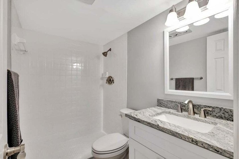 Beautifully remodeled ground floor unit in a gated 55 + - photo 11