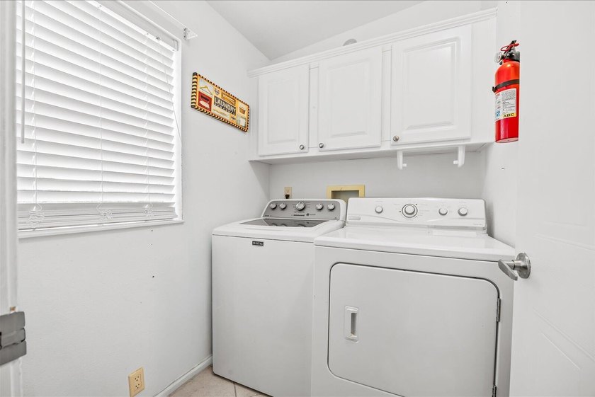 Welcome to your Florida retirement dream! Nestled on a quiet - photo 26