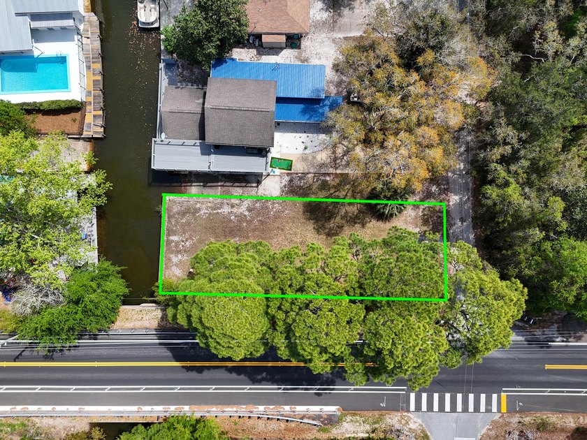 WATERFRONT BUILDABLE LOT! Build your dream home on this canal - photo 2