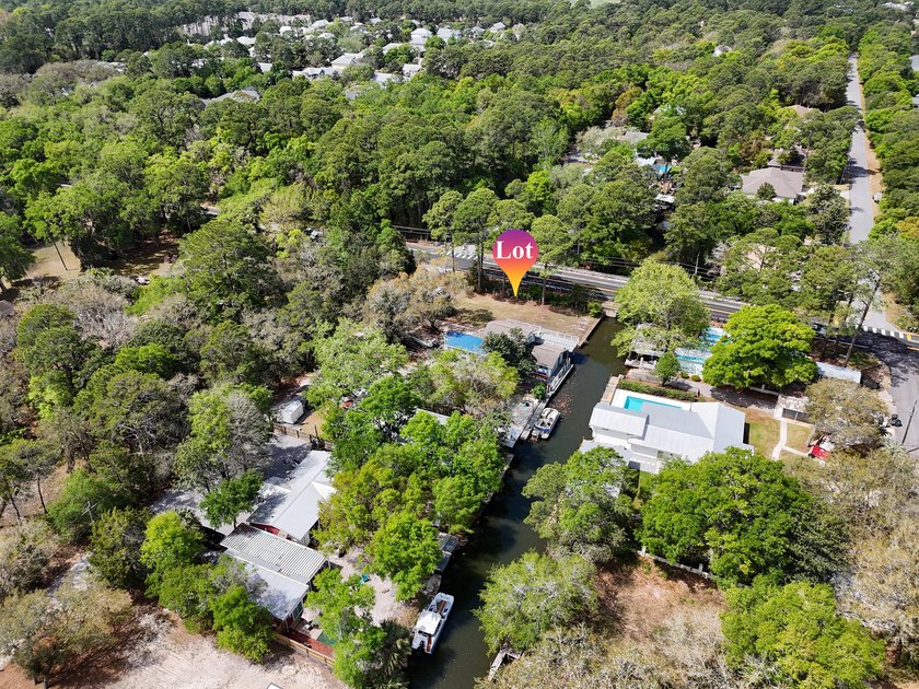 WATERFRONT BUILDABLE LOT! Build your dream home on this canal - photo 9