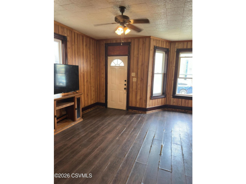 Opportunity awaits with this 3-bedroom, 2 bath half double - photo 2