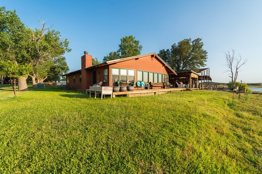 Beautiful home on Lake Sweetwater, WITH water views! This - photo 3