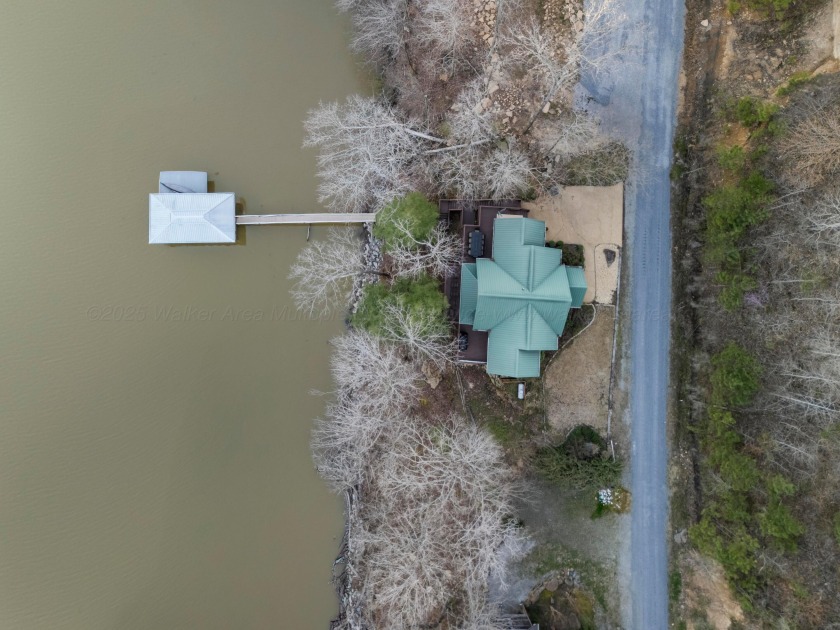 Smith Lake/Rock Creek: Lovely lake home sits among the trees - photo 42