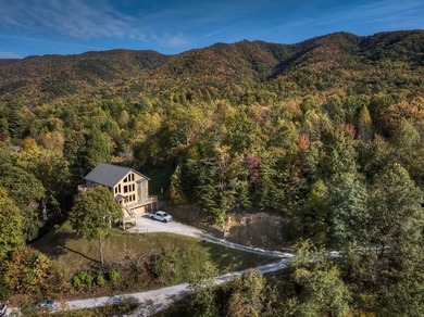 Welcome to Grand View Falls, where this custom-built residence - photo 3