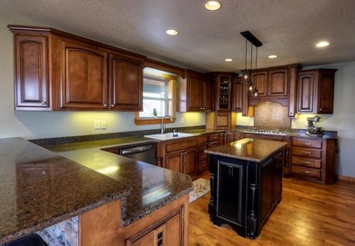Welcome to Grand View Falls, where this custom-built residence - photo 8