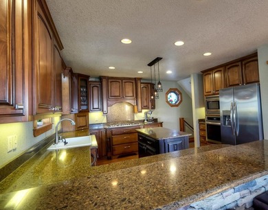 Welcome to Grand View Falls, where this custom-built residence - photo 11
