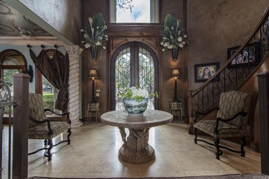 Nestled within the exclusive gated community of Valley Falls