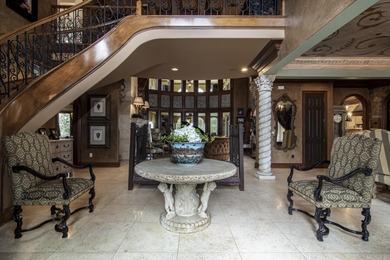 Nestled within the exclusive gated community of Valley Falls