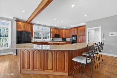 Welcome to this immaculate 4-bedroom LAKEFRONT home in the - photo 12
