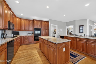 Welcome to this immaculate 4-bedroom LAKEFRONT home in the - photo 14