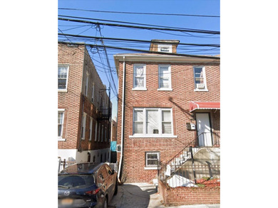 short sale vacant 2 family property with finished basement and - photo 1