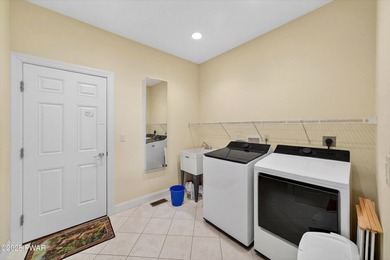 Welcome to this immaculate 4-bedroom LAKEFRONT home in the - photo 22