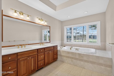 Welcome to this immaculate 4-bedroom LAKEFRONT home in the - photo 28