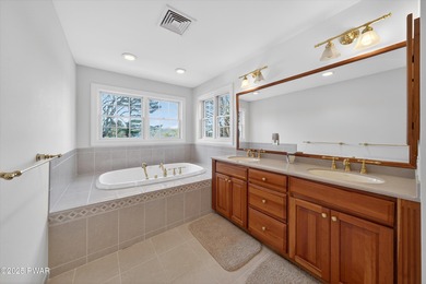 Welcome to this immaculate 4-bedroom LAKEFRONT home in the - photo 40