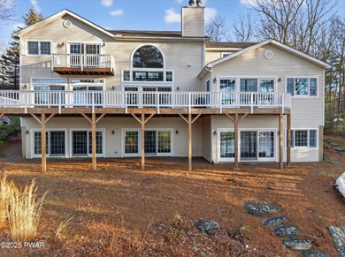 Welcome to this immaculate 4-bedroom LAKEFRONT home in the - photo 56