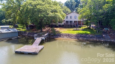 Welcome to this 4-bedroom, 3-bathroom waterfront retreat on the - photo 1