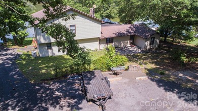 Welcome to this 4-bedroom, 3-bathroom waterfront retreat on the - photo 2