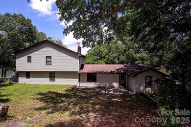 Welcome to this 4-bedroom, 3-bathroom waterfront retreat on the - photo 3