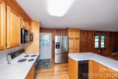 Welcome to this 4-bedroom, 3-bathroom waterfront retreat on the - photo 7