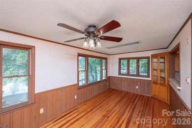 Welcome to this 4-bedroom, 3-bathroom waterfront retreat on the - photo 10