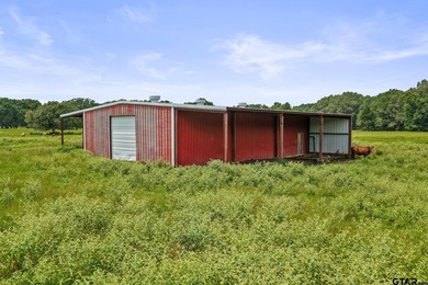 This stunning two-story home is situated on 45 acres in the - photo 33