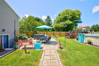 Welcome to this beautifully maintained raised ranch nestled on - photo 4