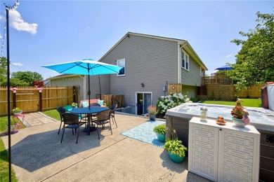 Welcome to this beautifully maintained raised ranch nestled on - photo 10