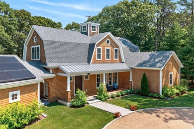 Set on an oversized 2.94-acre corner parcel within Osterville's - photo 3