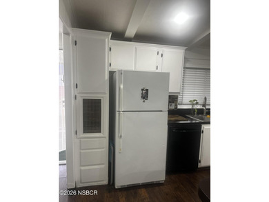 Ready to move in? This 2-bedroom 2-bath mobile home is waiting - photo 6