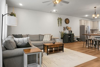 Welcome to 305 Lanyard Street -- an elevated, elegant townhome