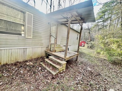Situated on approximately 0.9 acres, this 1985 18x80 single-wide - photo 6