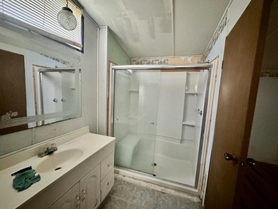 Situated on approximately 0.9 acres, this 1985 18x80 single-wide - photo 7
