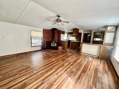 Situated on approximately 0.9 acres, this 1985 18x80 single-wide - photo 10