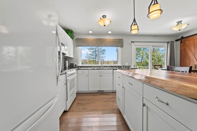 PRICE JUST REDUCED of this CHARMING LAKEFRONT RETREAT ON - photo 11