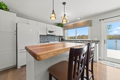 PRICE JUST REDUCED of this CHARMING LAKEFRONT RETREAT ON - photo 12