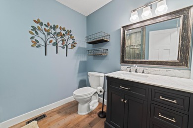 PRICE JUST REDUCED of this CHARMING LAKEFRONT RETREAT ON - photo 15