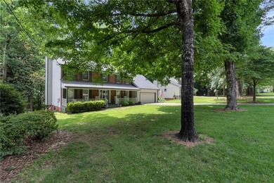 Welcome to this timeless Southern charmer in the highly - photo 3