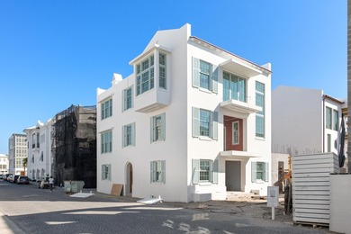Indulge in the epitome of coastal opulence at 208 Sea Garden St - photo 1