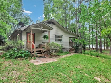 Waterfront Retreat on Lake Pinkston! Nestled on 1.21 acres with