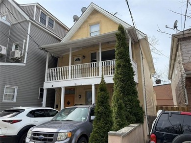 Welcome to this well-maintained 2-family home in Staten Island - photo 2